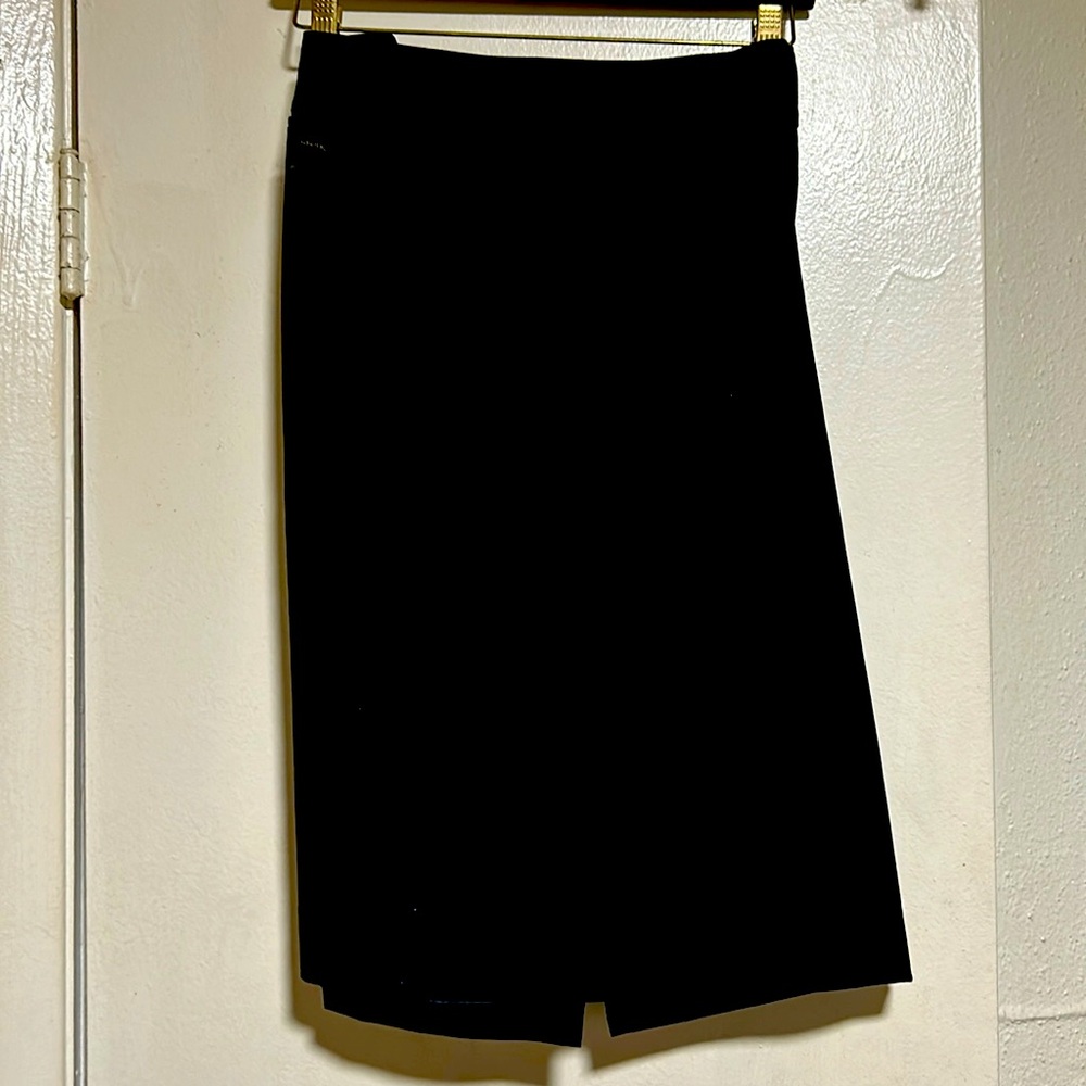 Calvin Klein women’s black knee length suit skirt 6” slit in back size 18